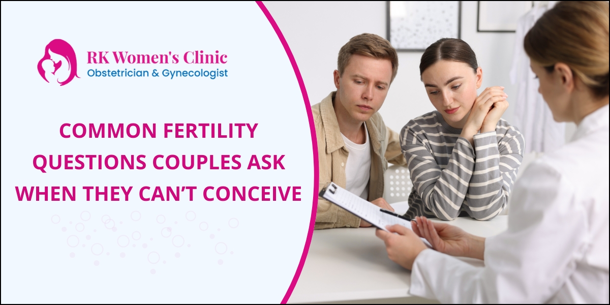 Couple asking questions to gynecologist because they are not able to conceiving